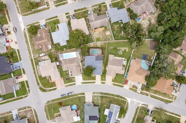 8629 Wolf Den Trl, Port Richey, FL 34668 - aerial view of property and surrounding area featuring nearby suburban area