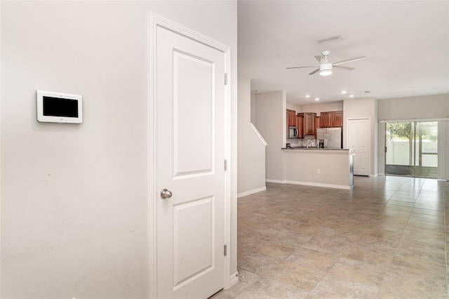 9741 Mulberry Marsh Ln, Sun City Center, FL 33573 - unfurnished living room with ceiling fan and recessed lighting