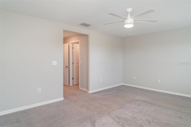 9741 Mulberry Marsh Ln, Sun City Center, FL 33573 - spare room with a ceiling fan and carpet floors