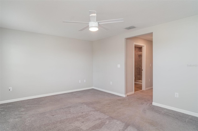 9741 Mulberry Marsh Ln, Sun City Center, FL 33573 - carpeted spare room with ceiling fan and baseboards