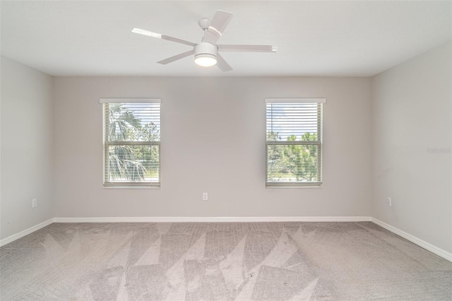 9741 Mulberry Marsh Ln, Sun City Center, FL 33573 - unfurnished room with plenty of natural light, carpet flooring, and ceiling fan