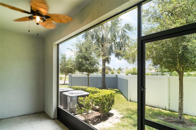 9741 Mulberry Marsh Ln, Sun City Center, FL 33573 - unfurnished sunroom with ceiling fan