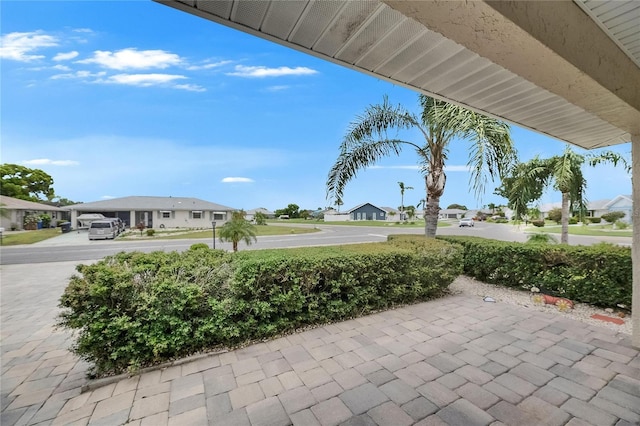 1502 Fort Duquesna Dr, Sun City Center, FL 33573 - view of patio / terrace featuring a residential view