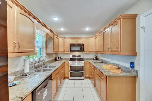 1502 Fort Duquesna Dr, Sun City Center, FL 33573 - kitchen featuring black appliances, light tile patterned flooring, light stone countertops, and recessed lighting