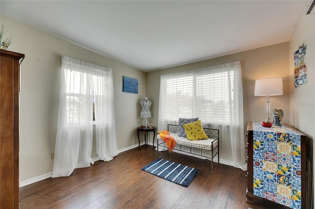 1502 Fort Duquesna Dr, Sun City Center, FL 33573 - sitting room with healthy amount of natural light and wood finished floors