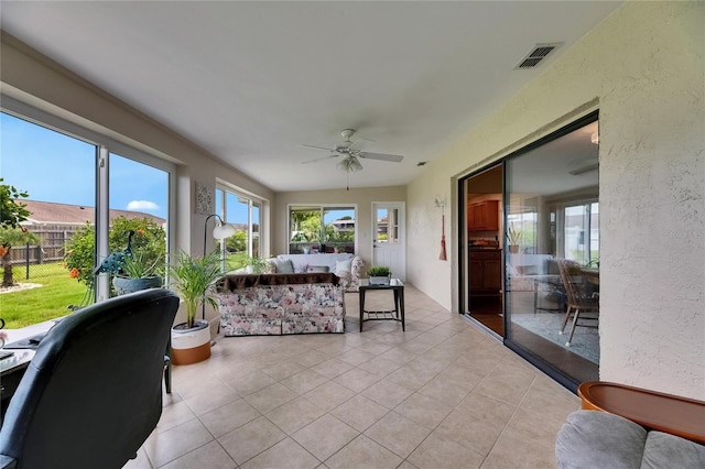 1502 Fort Duquesna Dr, Sun City Center, FL 33573 - sunroom featuring a ceiling fan and an outdoor living space