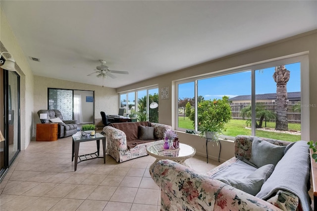 1502 Fort Duquesna Dr, Sun City Center, FL 33573 - living area featuring light tile patterned floors and ceiling fan