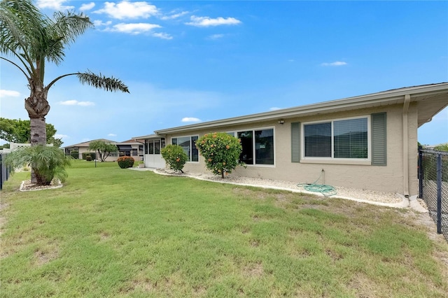 1502 Fort Duquesna Dr, Sun City Center, FL 33573 - back of property featuring stucco siding