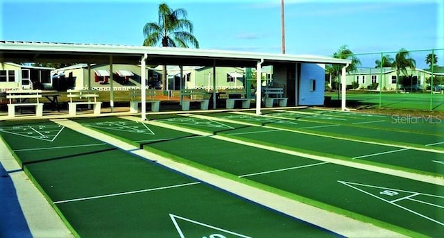 1502 Fort Duquesna Dr, Sun City Center, FL 33573 - surrounding community featuring shuffleboard
