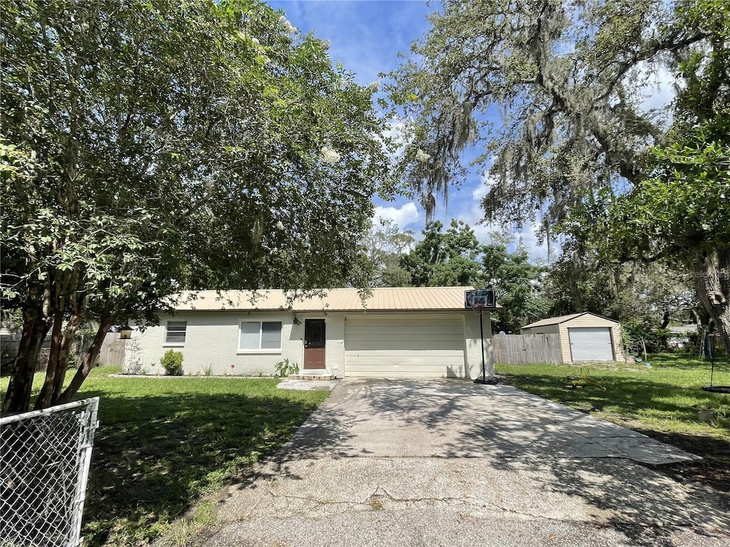 9844 Xenia St, New Port Richey, FL 34654 - single story home featuring a garage and driveway
