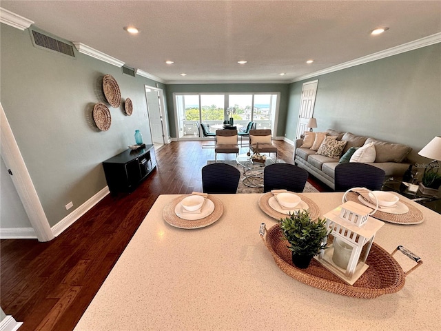 1365 Snell Isle Blvd NE Unit 6E, Saint Petersburg, FL 33704 - living room featuring dark wood finished floors, crown molding, and recessed lighting