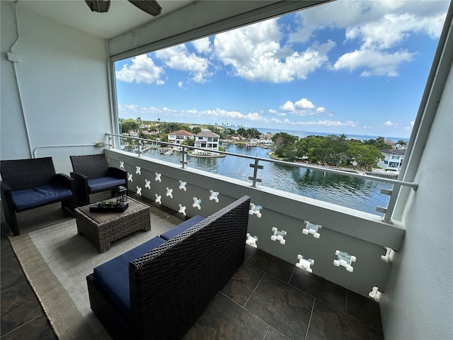 1365 Snell Isle Blvd NE Unit 6E, Saint Petersburg, FL 33704 - balcony with a water view, a ceiling fan, and an outdoor living space