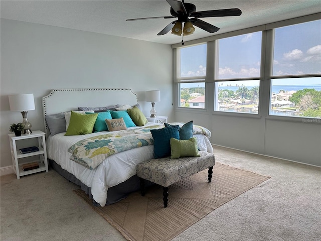 1365 Snell Isle Blvd NE Unit 6E, Saint Petersburg, FL 33704 - bedroom featuring light carpet and a ceiling fan