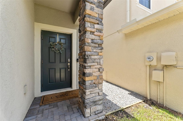 1604 Acadia Harbor Pl, Brandon, FL 33511 - view of exterior entry featuring stucco siding