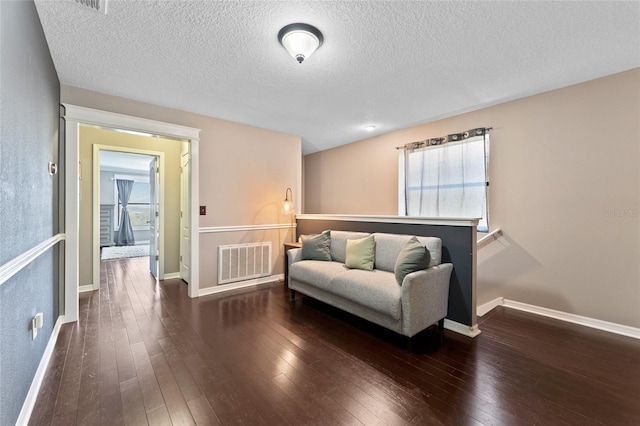 1604 Acadia Harbor Pl, Brandon, FL 33511 - sitting room featuring hardwood / wood-style floors and a textured ceiling