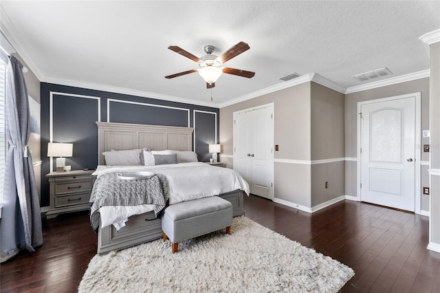 1604 Acadia Harbor Pl, Brandon, FL 33511 - bedroom with dark wood finished floors, crown molding, and a ceiling fan
