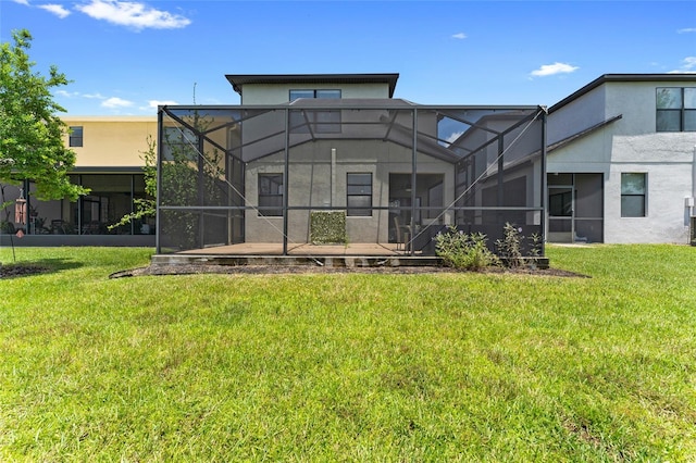 1604 Acadia Harbor Pl, Brandon, FL 33511 - rear view of property featuring stucco siding and a yard