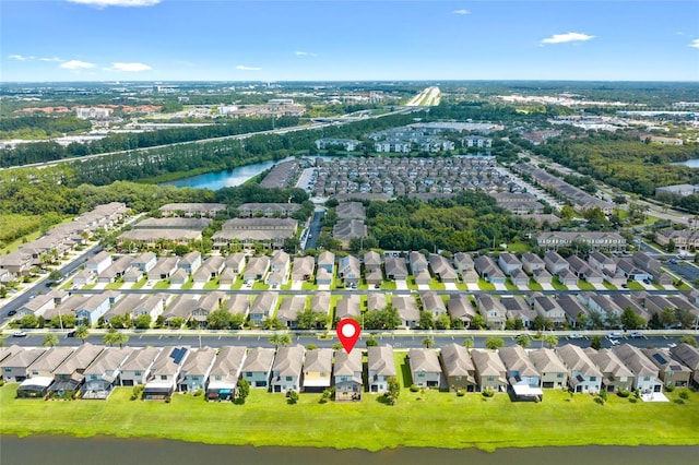 1604 Acadia Harbor Pl, Brandon, FL 33511 - aerial view of property's location featuring a nearby body of water and nearby suburban area