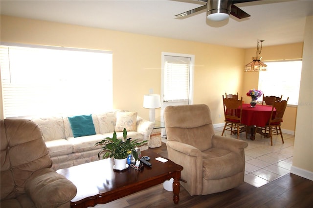 402 Dorchester Pl Unit 44, Sun City Center, FL 33573 - living area with healthy amount of natural light, a ceiling fan, and wood finished floors