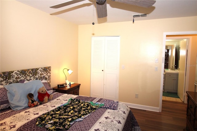 402 Dorchester Pl Unit 44, Sun City Center, FL 33573 - bedroom with wood finished floors, ceiling fan, and a closet