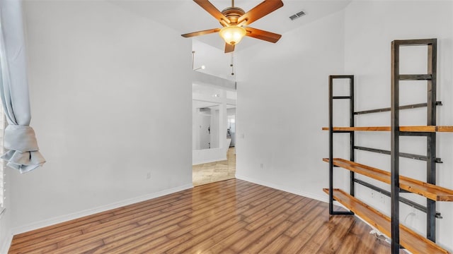 2202 Hickory Ridge Dr, Valrico, FL 33596 - spare room with a ceiling fan and wood finished floors