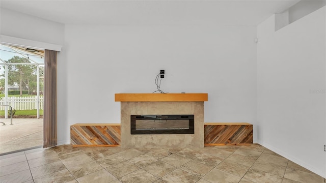 2202 Hickory Ridge Dr, Valrico, FL 33596 - unfurnished living room featuring a glass covered fireplace