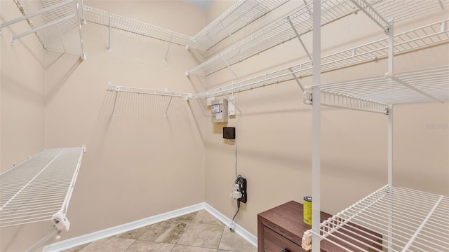 2202 Hickory Ridge Dr, Valrico, FL 33596 - walk in closet with tile patterned flooring