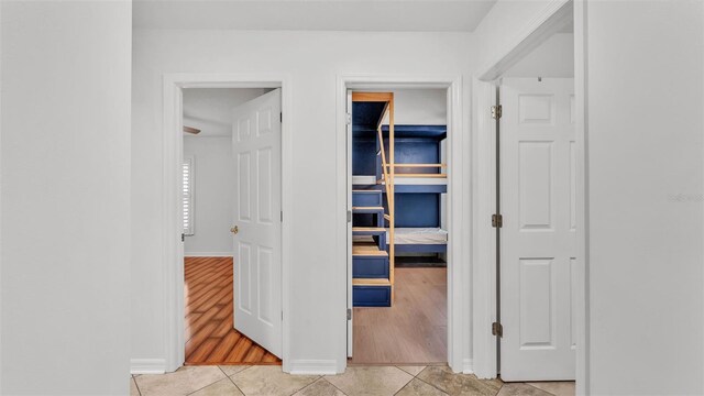 2202 Hickory Ridge Dr, Valrico, FL 33596 - hallway featuring light tile patterned flooring