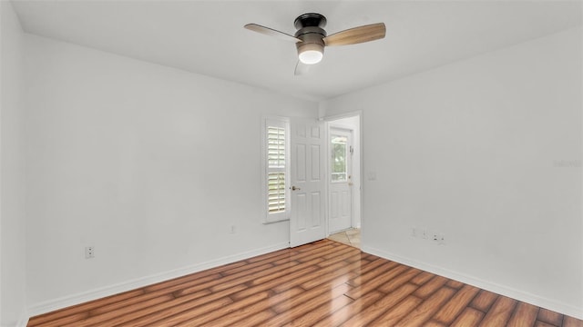 2202 Hickory Ridge Dr, Valrico, FL 33596 - empty room featuring wood finished floors and a ceiling fan