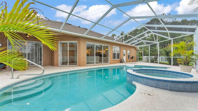 2202 Hickory Ridge Dr, Valrico, FL 33596 - view of swimming pool with a patio, a pool with connected hot tub, and a lanai