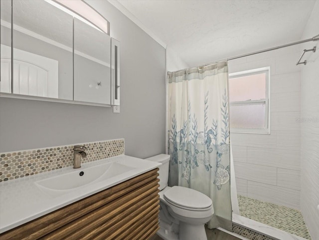 13316 Carol Dr, Hudson, FL 34667 - bathroom featuring vanity, tiled shower, and tasteful backsplash
