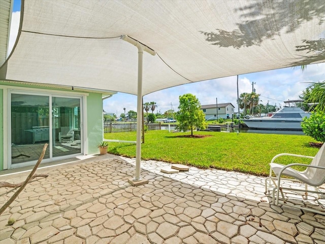 13316 Carol Dr, Hudson, FL 34667 - view of patio / terrace featuring a water view