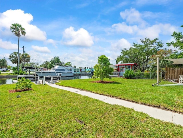 13316 Carol Dr, Hudson, FL 34667 - view of yard featuring a dock and a water view
