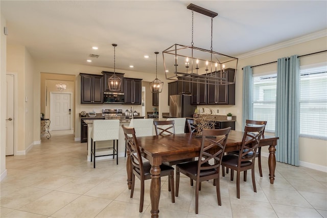 19309 Prairie Tree Pl, Tampa, FL 33647 - dining area featuring light tile patterned floors, ornamental molding, recessed lighting, and a chandelier