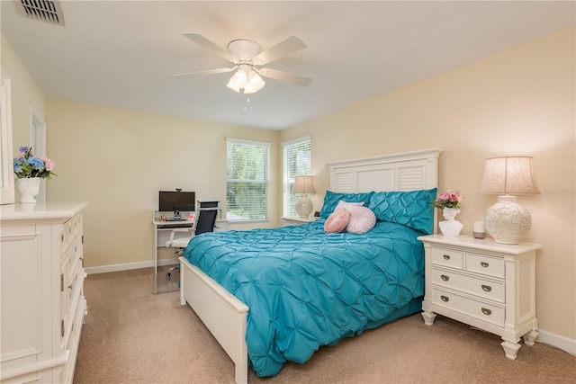 19309 Prairie Tree Pl, Tampa, FL 33647 - bedroom with light colored carpet, a ceiling fan, and an office area