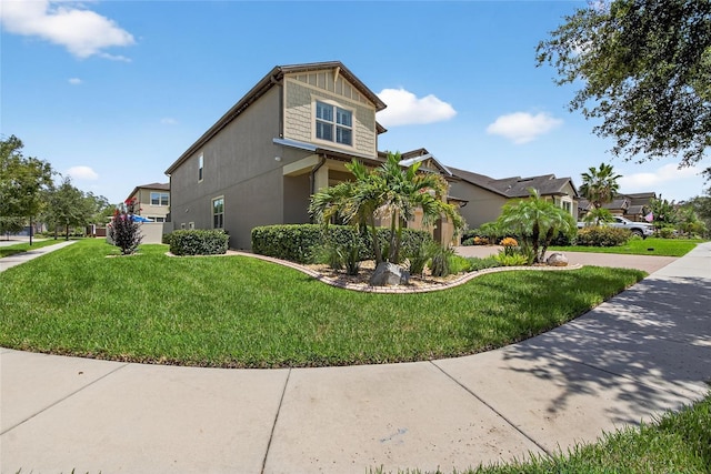 10313 Scarlet Chase Dr, Riverview, FL 33569 - view of side of property featuring a yard and stucco siding