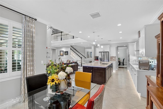 10313 Scarlet Chase Dr, Riverview, FL 33569 - dining area featuring light tile patterned floors, stairs, recessed lighting, crown molding, and a ceiling fan