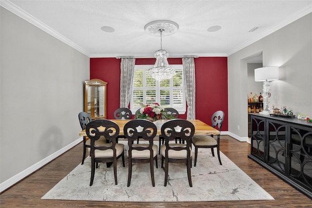 10313 Scarlet Chase Dr, Riverview, FL 33569 - dining room featuring a chandelier, crown molding, and wood finished floors