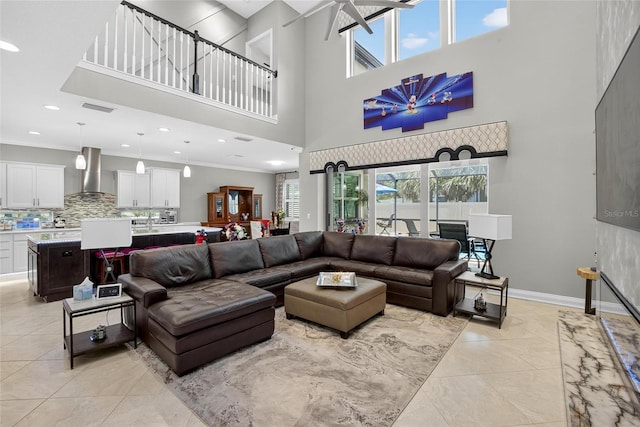 10313 Scarlet Chase Dr, Riverview, FL 33569 - living room featuring a towering ceiling, recessed lighting, and crown molding