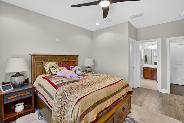 10313 Scarlet Chase Dr, Riverview, FL 33569 - bedroom featuring hardwood / wood-style flooring, ensuite bathroom, and a ceiling fan
