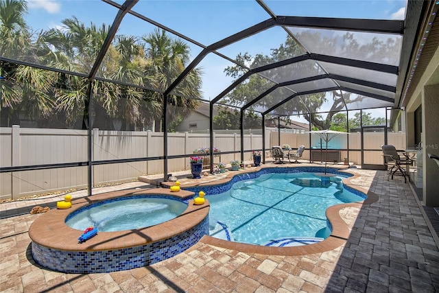 10313 Scarlet Chase Dr, Riverview, FL 33569 - view of pool featuring a patio, a fenced backyard, glass enclosure, and a pool with connected hot tub