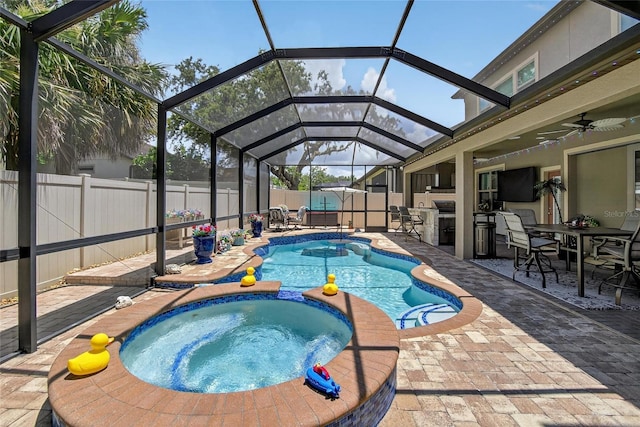 10313 Scarlet Chase Dr, Riverview, FL 33569 - view of pool with a fenced backyard, a patio area, a pool with connected hot tub, glass enclosure, and ceiling fan