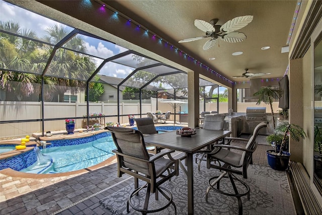 10313 Scarlet Chase Dr, Riverview, FL 33569 - fenced backyard featuring exterior kitchen, a patio, a ceiling fan, a pool with connected hot tub, and outdoor dining space