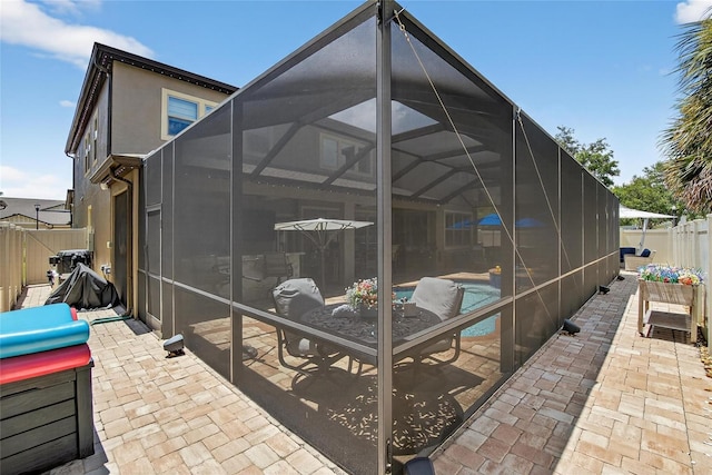 10313 Scarlet Chase Dr, Riverview, FL 33569 - rear view of house featuring a patio area, a fenced backyard, stucco siding, glass enclosure, and a swimming pool