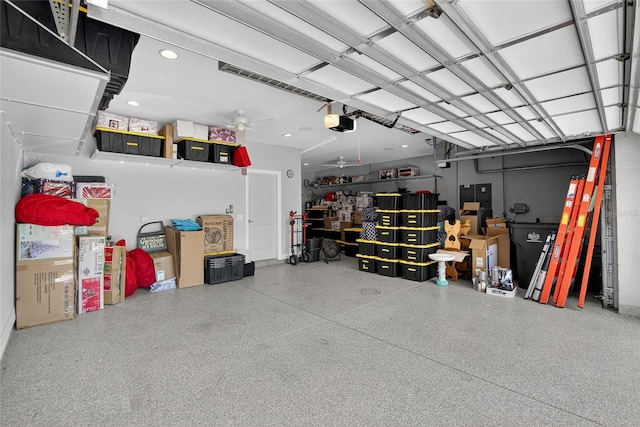 10313 Scarlet Chase Dr, Riverview, FL 33569 - garage with a garage door opener, ceiling fan, and recessed lighting