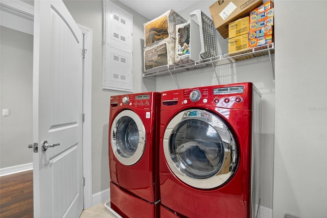 10313 Scarlet Chase Dr, Riverview, FL 33569 - laundry room featuring separate washer and dryer and wood finished floors