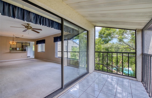 700 Starkey Rd Unit 1145, Largo, FL 33771 - unfurnished sunroom featuring a chandelier