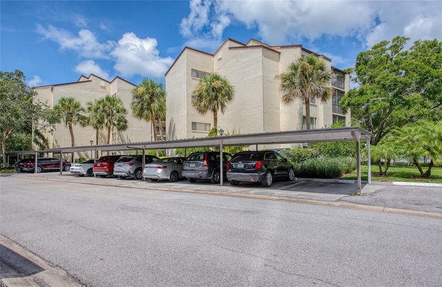 700 Starkey Rd Unit 1145, Largo, FL 33771 - view of property featuring covered parking