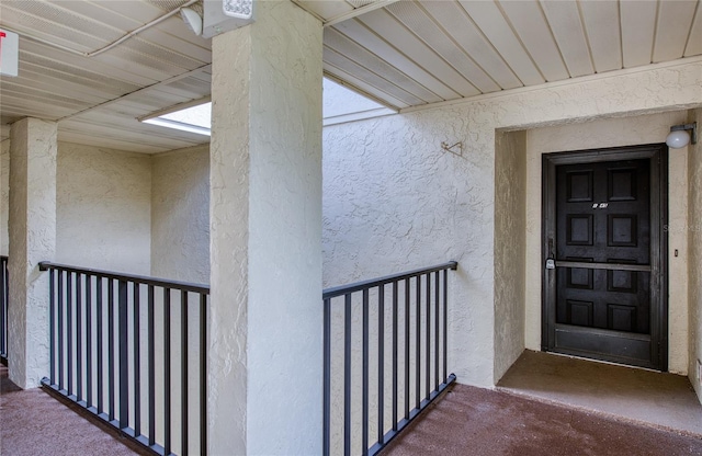 700 Starkey Rd Unit 1145, Largo, FL 33771 - view of exterior entry with stucco siding