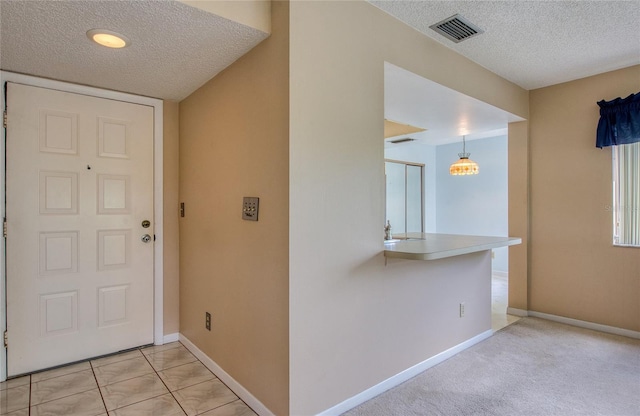 700 Starkey Rd Unit 1145, Largo, FL 33771 - foyer with a textured ceiling
